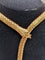 Collier Collier Serpenti vintage en or jaune 18kt avec émeraudes et rubis 58 Facettes
