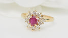 Bague Bague marguerite en or jaune, rubis et diamants 58 Facettes