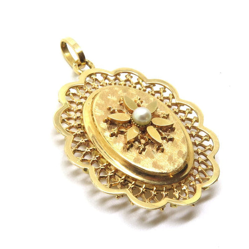 Pendentif Pendentif en or jaune et perle 58 Facettes