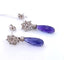 Boucles d'oreilles Boucles d'oreilles en or blanc serties de diamants et de tanzanite 58 Facettes