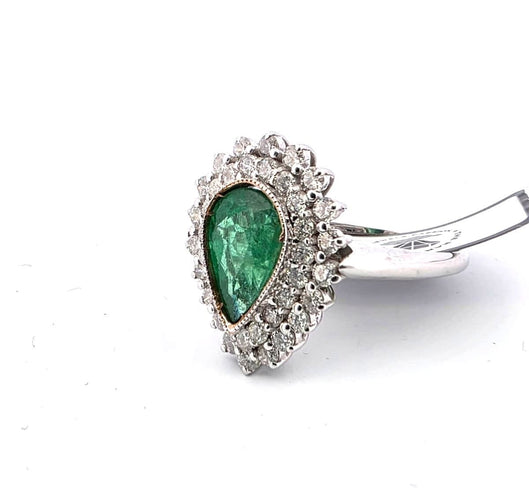 Anello in oro bianco con smeraldo centrale e diamanti a contorno 58 Facettes