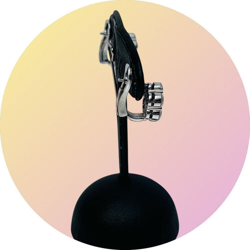 Clips d’oreilles marguerites en or gris et diamants