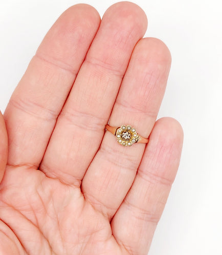 Bague 51.5 Bague marguerite or rose, diamant et perles (circa 1900) 58 Facettes A06283