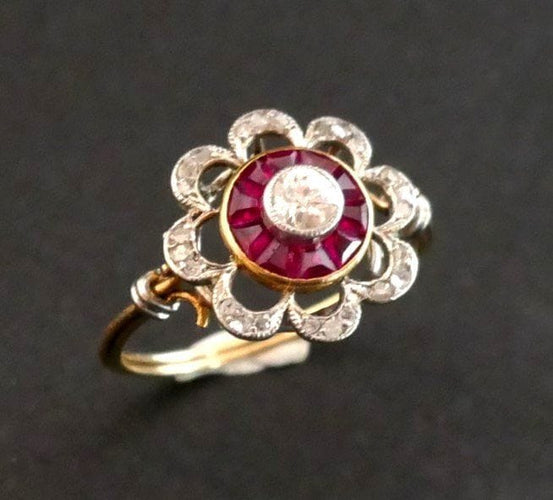 Bague 52.5 Bague Ornée d'un Diamant, entourage de Rubis Calibrés 58 Facettes