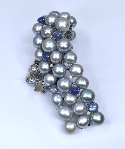 Bracelet Important bracelet or blanc, saphirs étoilés, diamants et perles grises 58 Facettes AB632