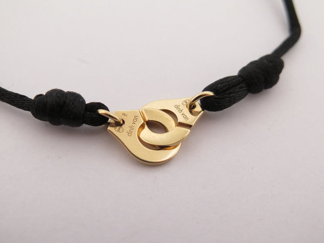 Bracelet bracelet DINH VAN menottes r10 341102 en or jaune 18k 2.9gr & cordon noir 58 Facettes 270151