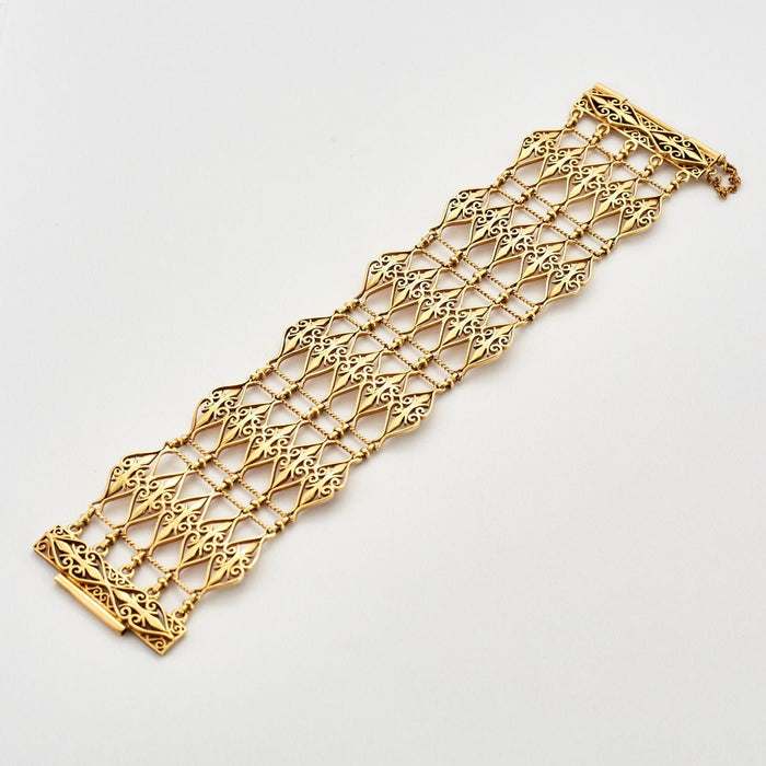 Bracelet Bracelet manchette à décor ajouré or jaune 58 Facettes