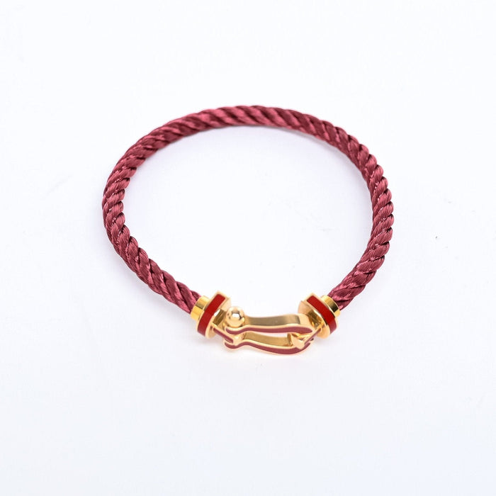 Bracelet FRED - Bracelet Force 10 GM or jaune et cordon bordeaux 58 Facettes 87168