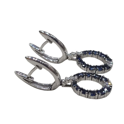 Boucles d'oreilles Boucles d'oreilles en or blanc 18 carats serties de saphirs et de diamants 58 Facettes PE697