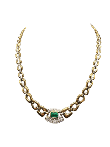 Collier Collier ras-de-cou en or jaune et blanc des années 1980, orné d'émeraudes et de diamants 58 Facettes
