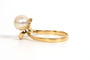 Bague 51 Bague Années 70 en or jaune 18 carats sertie d'une perle 58 Facettes 21857