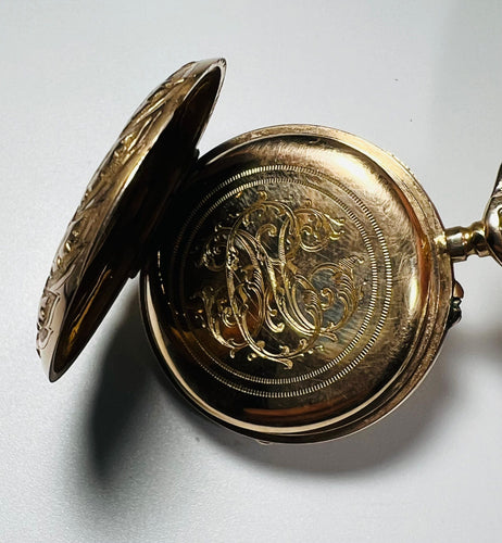 Montre Montre de col émaillé et sa chaîne en or jaune 58 Facettes 226