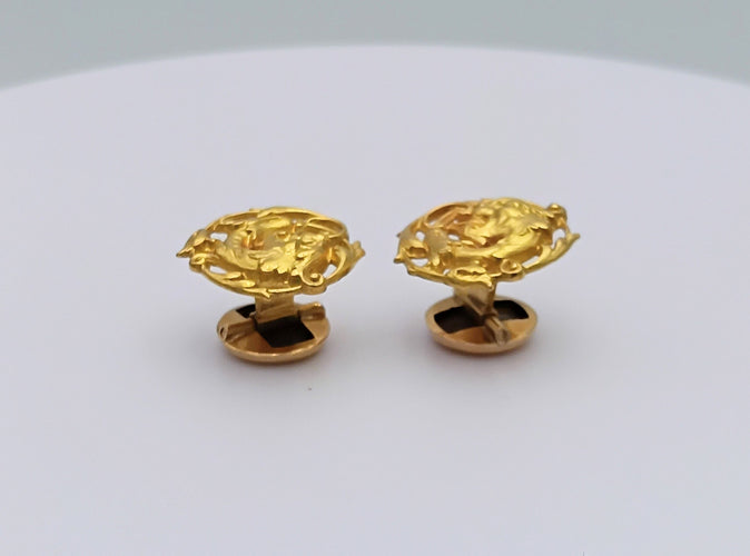Boutons de manchette Boutons de manchette vintage figurant une chimère en or 18k 58 Facettes