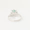 Bague 54 BAGUE MARGUERITE EMERAUDE ET DIAMANTS EN OR GRIS 18K 58 Facettes 0