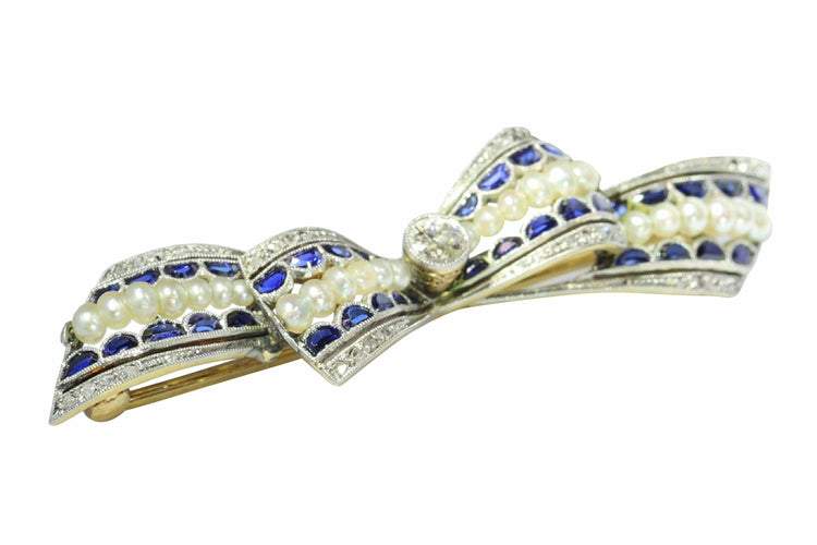 Broche Broche nœud vintage des années 1910 en saphirs et perles – Belle Époque Grace 58 Facettes 25191-0322