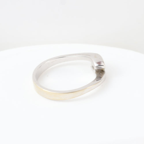 Bague solitaire en or blanc 18 carats et diamant de 0,16 carat.