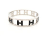 Bracelet bracelet HERMES rondo ash h rotatifs 20cm acier paladie & laque noir 58 Facettes 264585