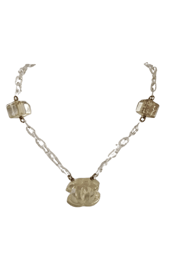 Collier Chanel - Collier Ice Cube vintage en métal doré et résine 58 Facettes