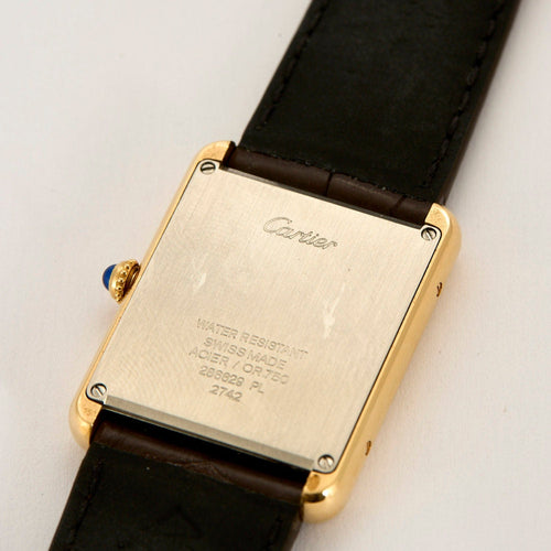 Montre Cartier - Montre Tank acier et or jaune 58 Facettes