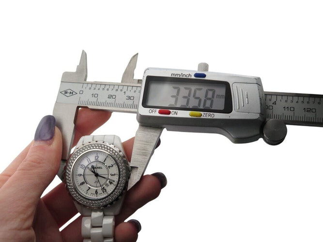 Montre montre CHANEL j12 34 mm h0967 112 diamants ceramique blanche quartz 58 Facettes 268147