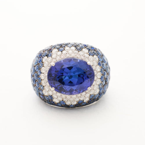 Bague 56 Bague or gris, tanzanite, entourage diamants et saphirs 58 Facettes