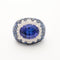 Bague 56 Bague or gris, tanzanite, entourage diamants et saphirs 58 Facettes