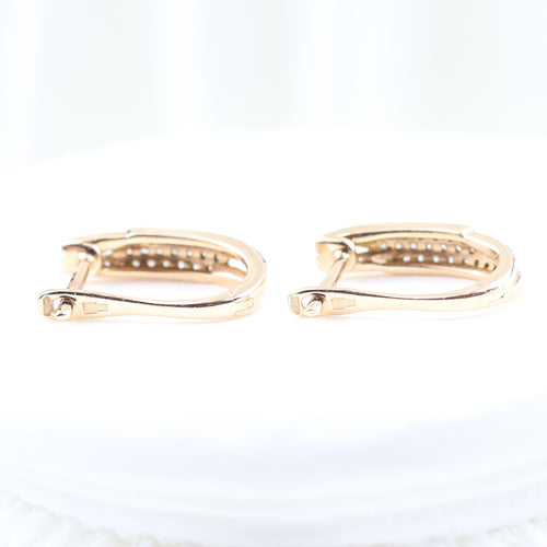 Boucles d'oreilles Boucles d'oreilles triple pavé en or rose 18 carats serties de diamants taille brillant 58 Facettes 132996