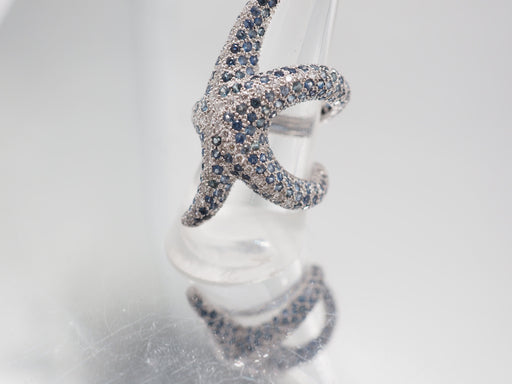 Ring 52 White gold starfish ring with sapphires and diamonds 58 Facettes