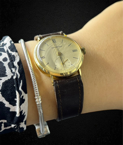 Montre-bracelet Longines Vintage en or jaune 18 carats