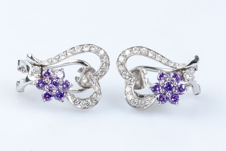 Bague Bague coeurs et fleurs en or blanc 18 carats 58 Facettes 111.20995-53