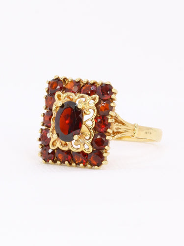Bague vintage or jaune grenats