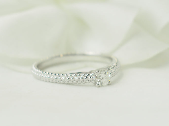 Bague 54 Bague solitaire Mauboussin "Fan du premier jour" en or blanc et diamant 58 Facettes 33608