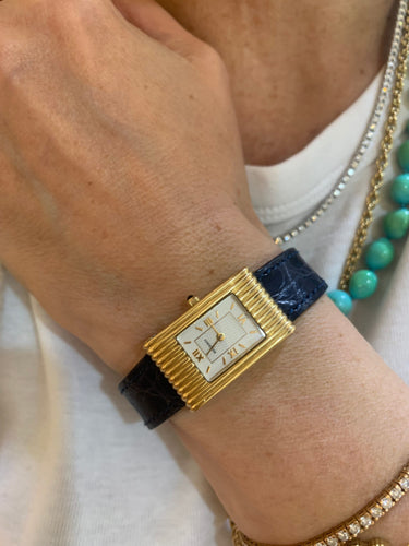 Montre Boucheron - Montre Reflet Small en or jaune 18 carats 58 Facettes M104