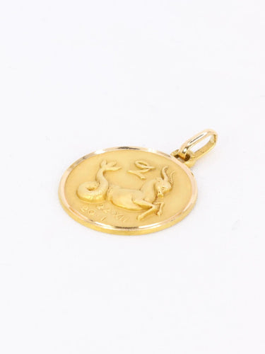 Pendentif Pendentif vintage signe du zodiaque Capricorne or jaune 58 Facettes 1099.22
