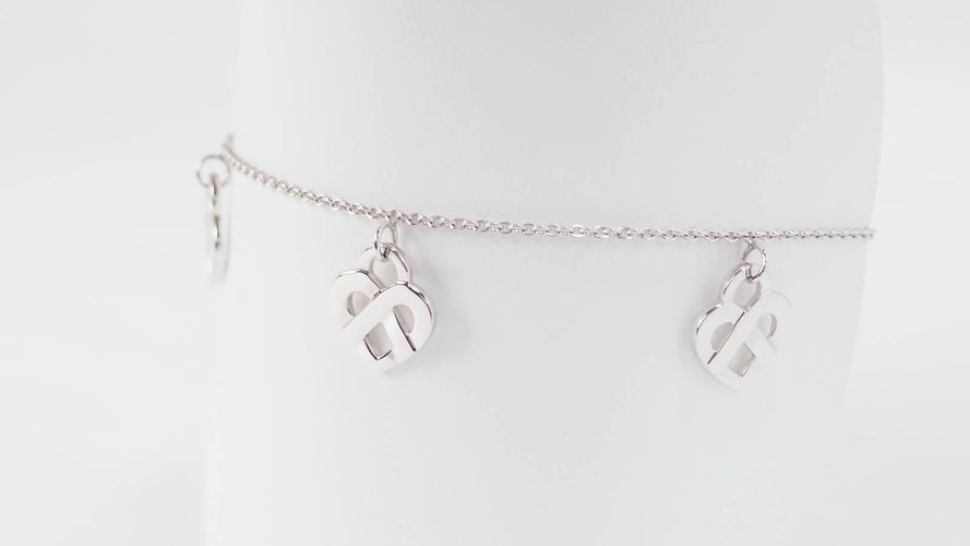 Bracelet Bracelet Poiray Coeur Entrelacé en or blanc 58 Facettes 32973