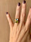 Bague 52 BULGARI - Bague Double Baccellato, or jaune avec topaze bleue et péridot, vers 1980 58 Facettes