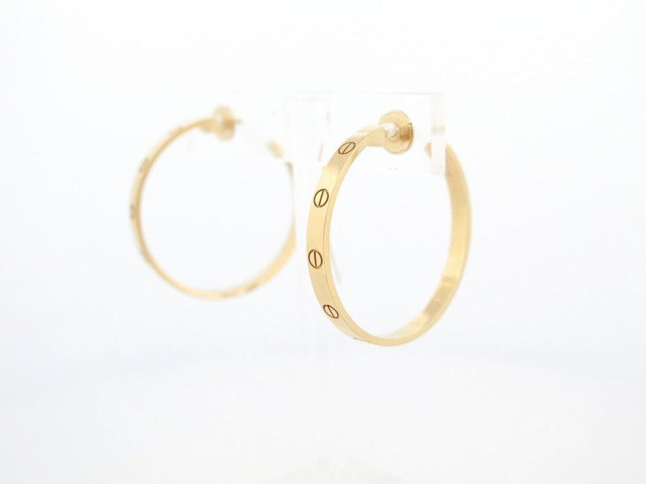 Boucles d'oreilles boucles d'oreilles CARTIER love creoles en or jaune 58 Facettes 260122