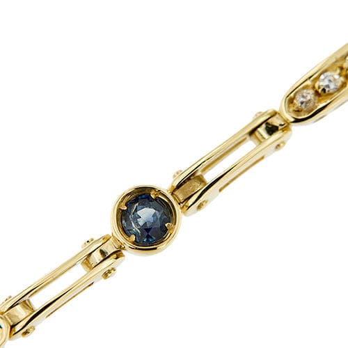 Bracelet segmenté en or jaune orné de saphirs et de diamants