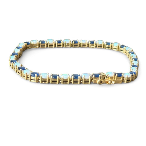 Bracelet or jaune serti de saphirs et opales
