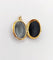 Pendentif Pendentif porte-photo or jaune et onyx (circa 1900) 58 Facettes A05916