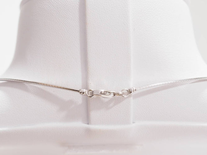 Collier Collier Oméga en or blanc 58 Facettes 32185