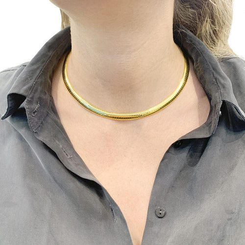 Collier vintage omega or jaune.