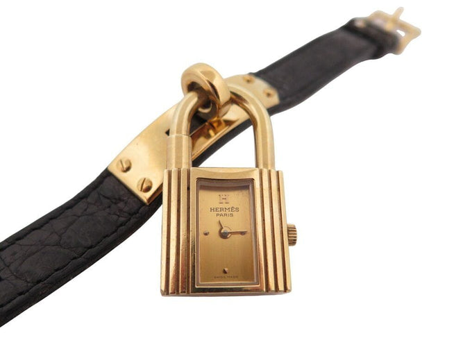 Montre montre vintage HERMES Kelly Mini Cadenas 20 mm plaque or quartz dame 58 Facettes 268902