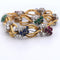 Bracelet Bracelet en or jaune orné de diamants et de pierres de couleur 58 Facettes