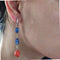 Boucles d'oreilles Paire de pendants d'oreilles tanzanite et corail 58 Facettes 26