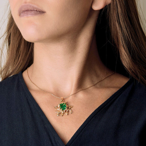 Pendentif Pendentif en or jaune à motif végétal et émeraude 58 Facettes BIA1084