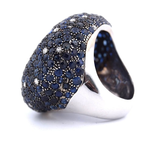 Bague 54 Bague en or blanc avec topaze, saphirs et diamants - Années 1950 58 Facettes