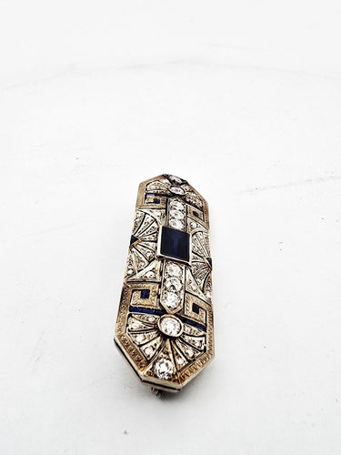 Broche Broche en or blanc, saphirs et diamants 58 Facettes