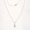 Collier Collier en or blanc serti d'un diamant de 0.15 carat 58 Facettes
