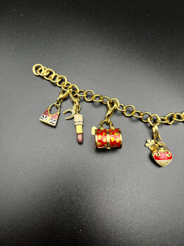 Bracelet Bracciale charms \"Pretty Woman\" en or jaune 58 Facettes